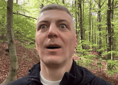 Surprised Man In Forest GIF