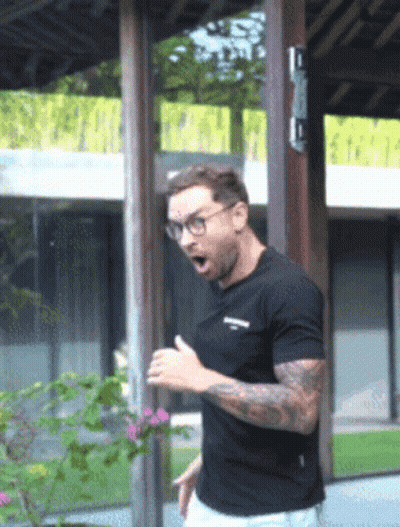 Surprised Man In Glasses And Black T-Shirt GIF