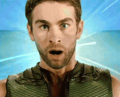 Surprised Man In Green Vest GIF