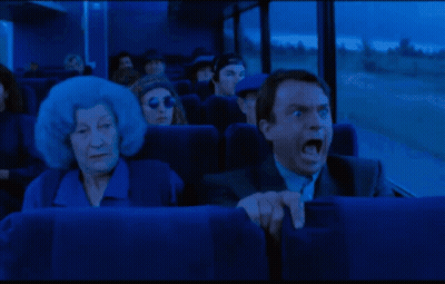 Surprised Man Sitting On Bus GIF