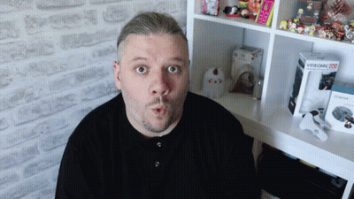 Surprised Man With Videomic 25 Box GIF