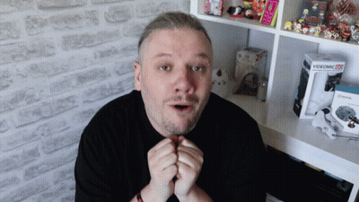 Surprised Man With Videomic 25 Box GIF