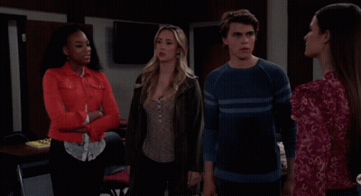 Surprised Woman Between Two Women GIF