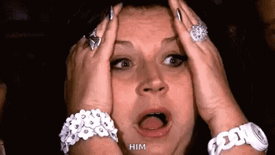 Surprised Woman Holding Head With Hands GIF