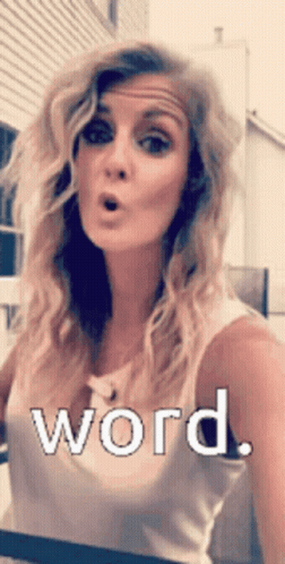 Surprised Woman In White Tank Top Saying Word GIF