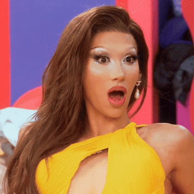 Surprised Woman In Yellow Dress GIF