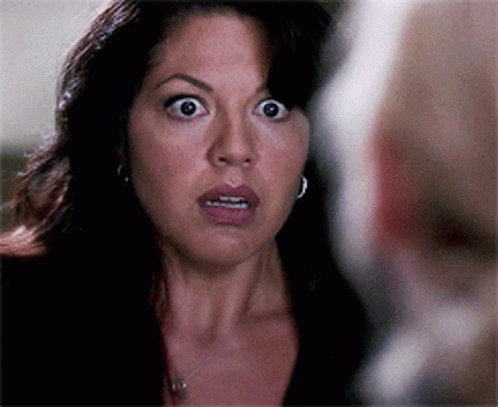 Surprised Woman Looking At Man GIF