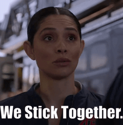 Surprised Woman Next To We Stick Together GIF