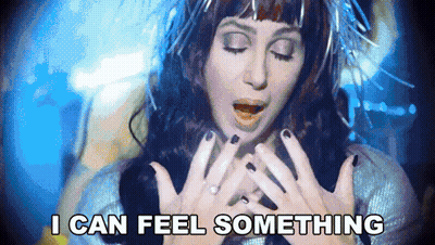 Surprised Woman Saying I Can Feel Something Above Her GIF
