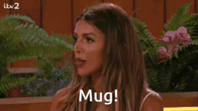 Surprised Woman Saying Mug GIF