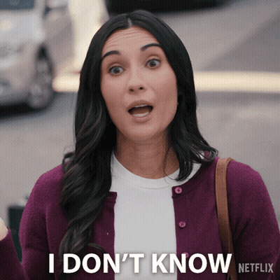 Surprised Woman Says I Don't Know GIF
