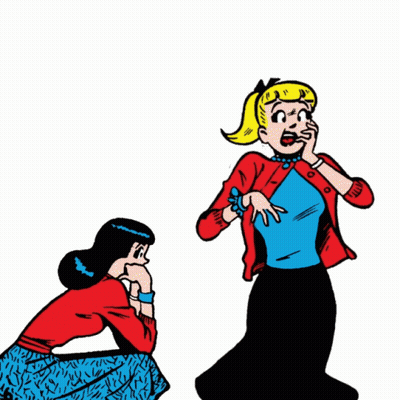 Surprised Woman Standing Next to Another Woman