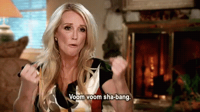 Surprised Woman Wearing WOW Shirt GIF