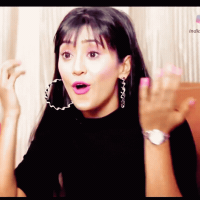 Surprised Woman With Hoop Earrings And Watch GIF