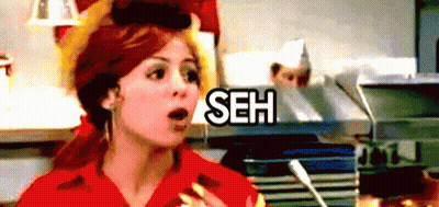 Mujer Sorprendida con la Palabra Seh Detrás GIF