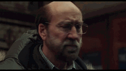 Suspicious Nic Cage Looking Around GIF