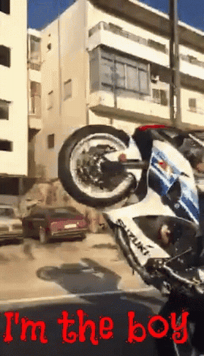 Suzuki Motorcycle Upside Down On Street GIF