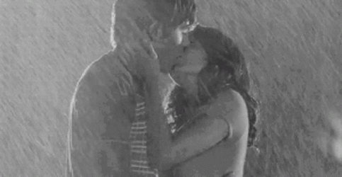 Sweet Couple Kissing In Monsoon Rain GIF