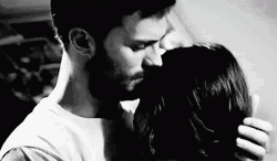 Sweet Guy Holding Her Head Forehead Kiss