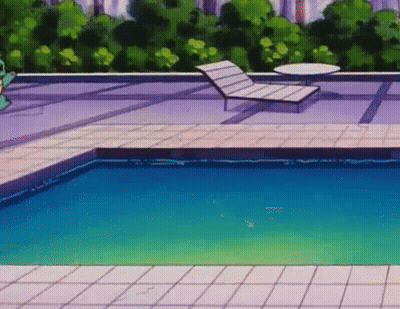 Swimming Pool Surrounded By Chairs And Table GIF