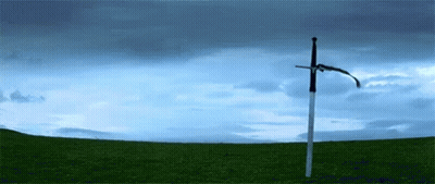 Sword Stuck In Grassy Field GIF