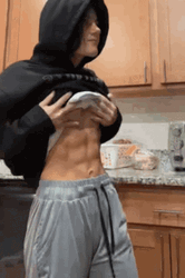 Sydney McGhee Revealing Her Abs GIF