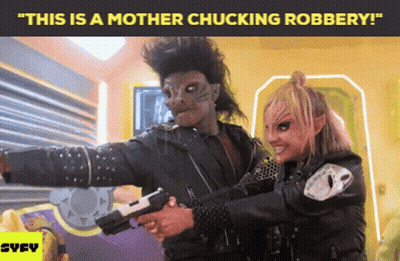 Syfy Poster Man And Woman Holding Guns GIF