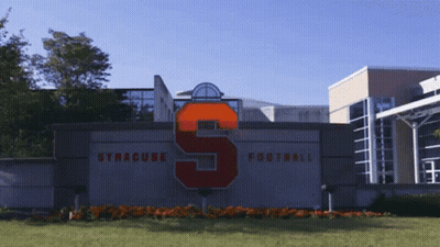 Syracuse Football Sign In Front Of Building GIF