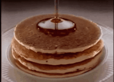 Syrup Being Poured On Pancakes GIF