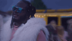 T Pain With Fur Scarf Around His Shoulders GIF