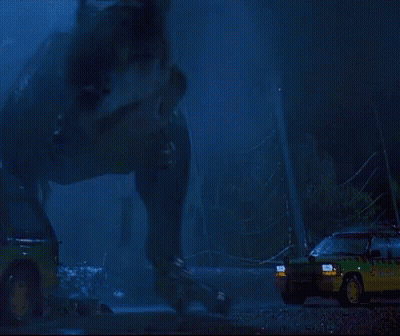 T-Rex Standing In Front Of Car Jurassic Park GIF