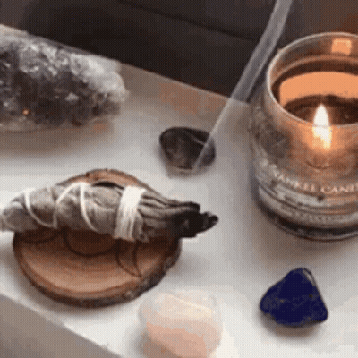 Table With Candle Sage Crystals Incense Sticks GIF
