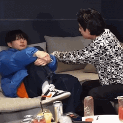 Taekook Hitting The Arms GIF