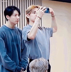 Taekook Looking At Phone GIF