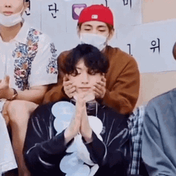 Taekook Touching Cheeks GIF