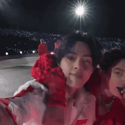 Taekook Using Microphones GIF