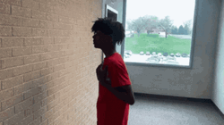 Talking To A Wall Young Black Boy GIF