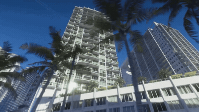 Tall Building With Palm Trees And Windows GIF