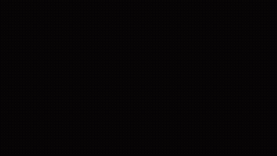 Tall Building With Smoke Stack In City GIF
