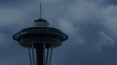 Tall Tower With Cloudy Sky GIF