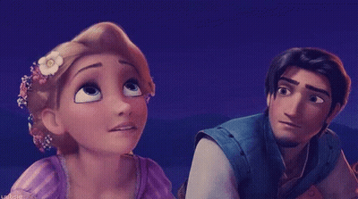 Tangled Man And Woman Looking At Each Other With Flower GIF