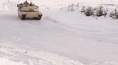 Tank Driving On Snowy Road GIF