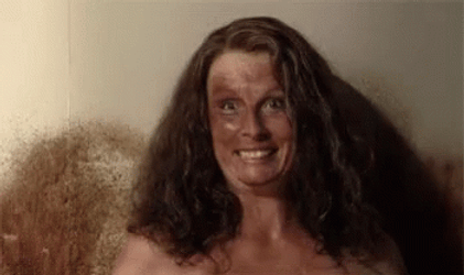 Tanning Spray On Her Face GIF