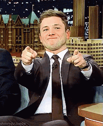 Taron Egerton Happily Pointing Fingers At You GIF