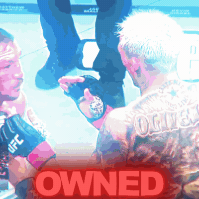 Tattooed Man Held, 'Owned' In Red GIF