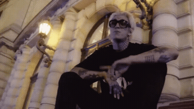 Tattooed Man Smoking Cigarette GIF