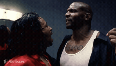Tattooed Man Talking To Another In Movie Clip GIF