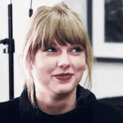 Taylor Swift Close Up With Ponytail And Bangs GIF