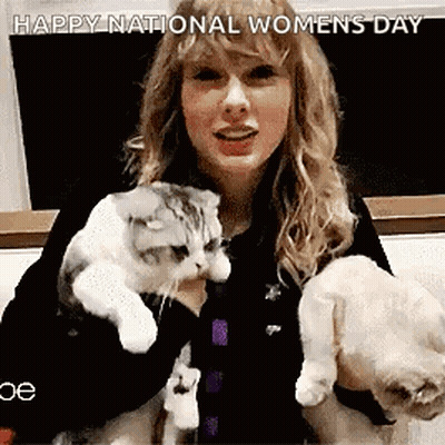 Taylor Swift Holding Two Cats And A Puppy GIF
