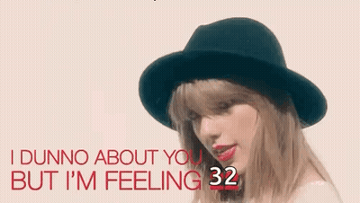 Taylor Swift In Black Hat And Red Lipstick Singing GIF